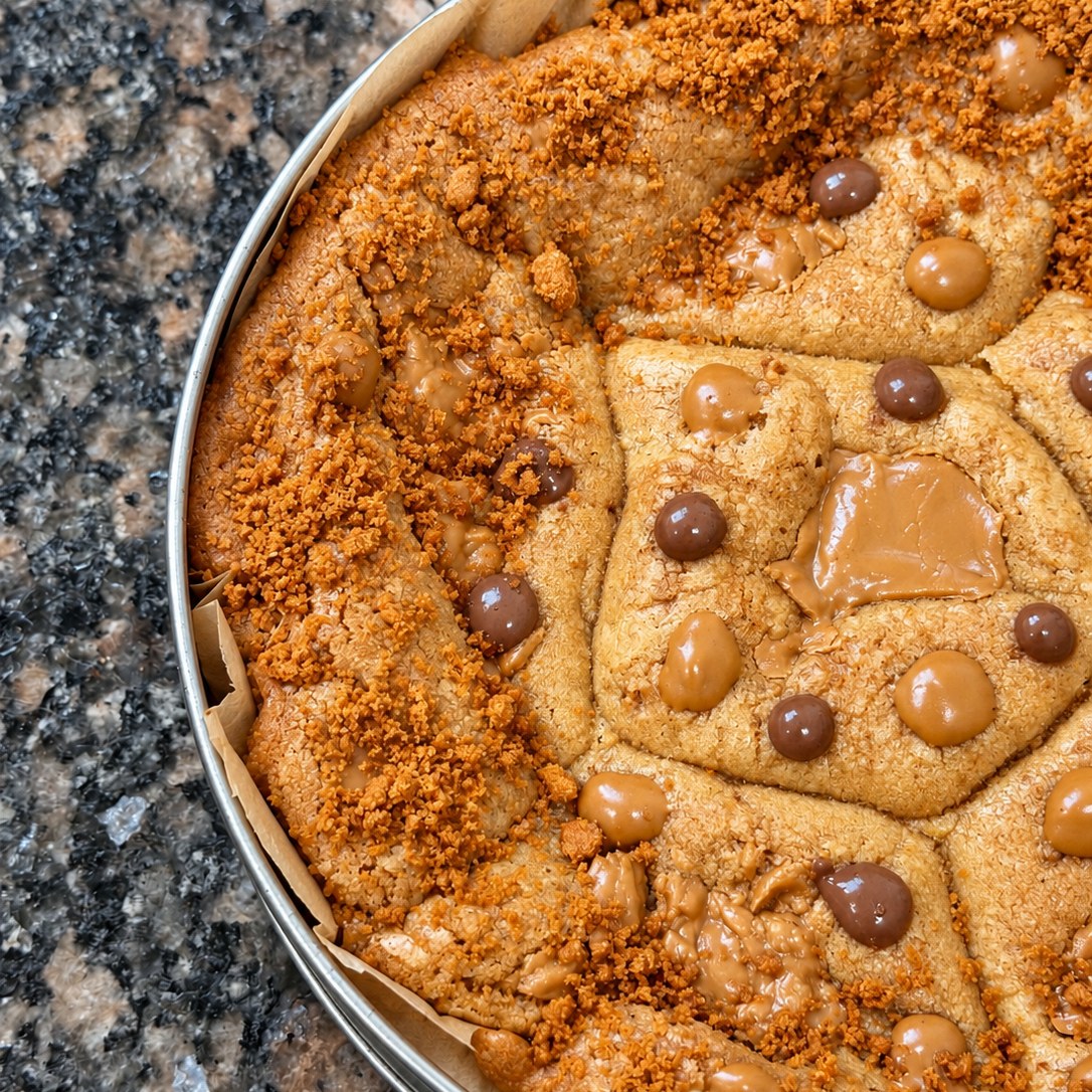 Biscoff Cookie close-up — cookie butter dollops, milk chocolate drops, and Biscoff crumb
